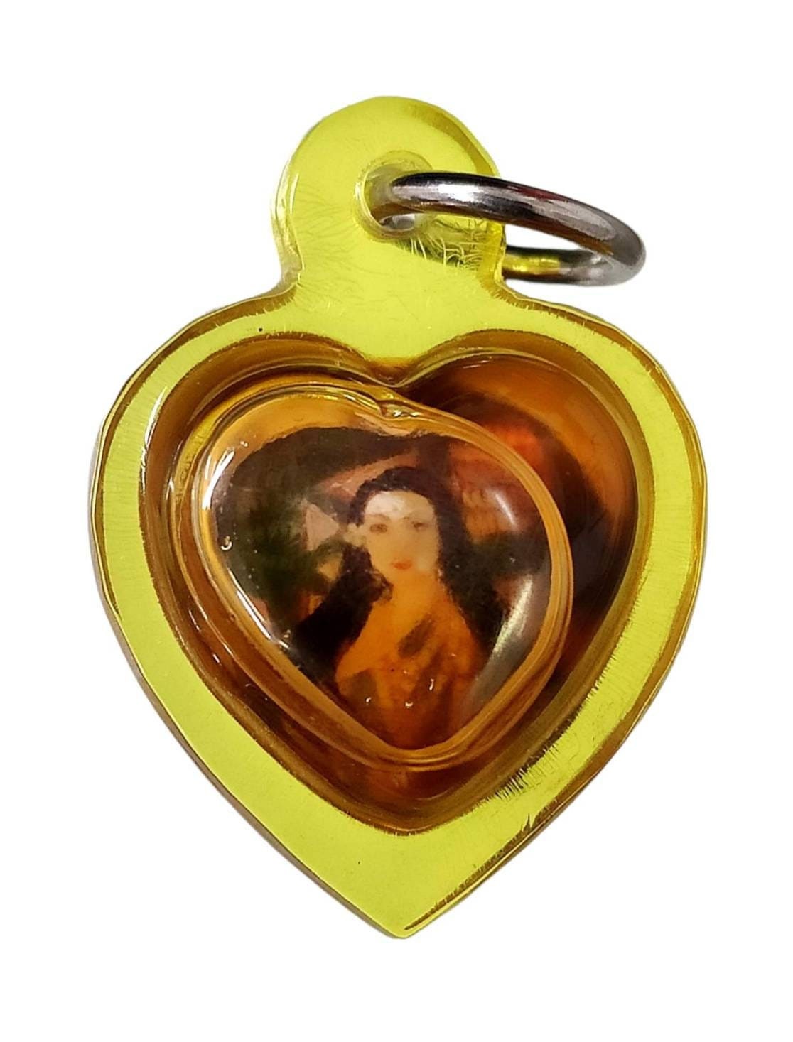 Heart Magic Pendant Locket Mae Tanee : Nang Tani A wonderful powerful item intended to Induce Improvements in your Professional Advancement